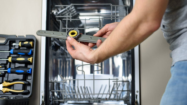 dishwasher with a broken part