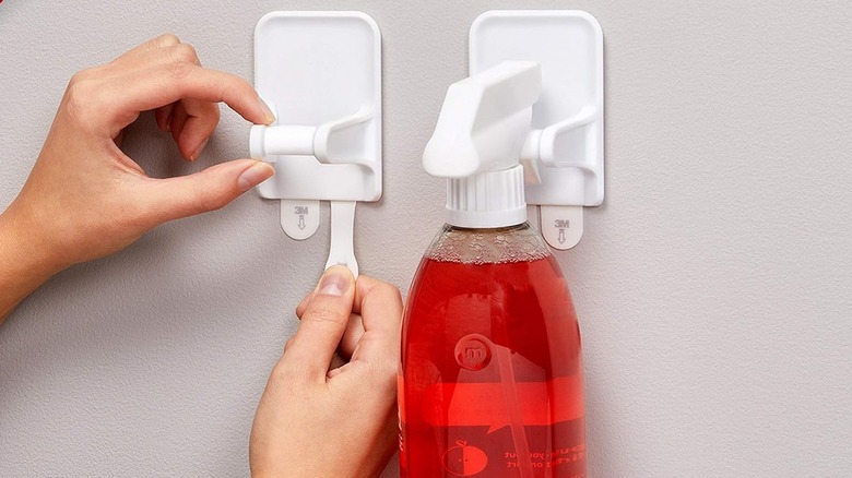 A hanging spray bottle on the wall