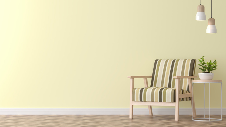 pastel yellow room with chair