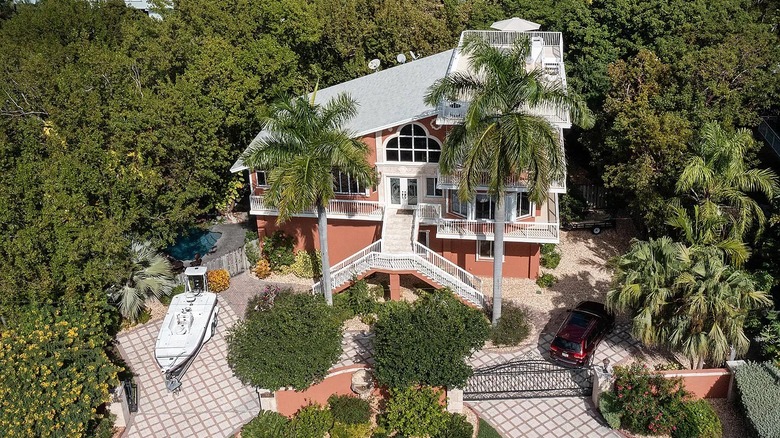 house in Florida with a boat