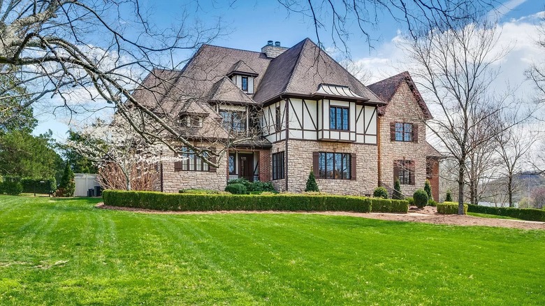 large home with green lawn