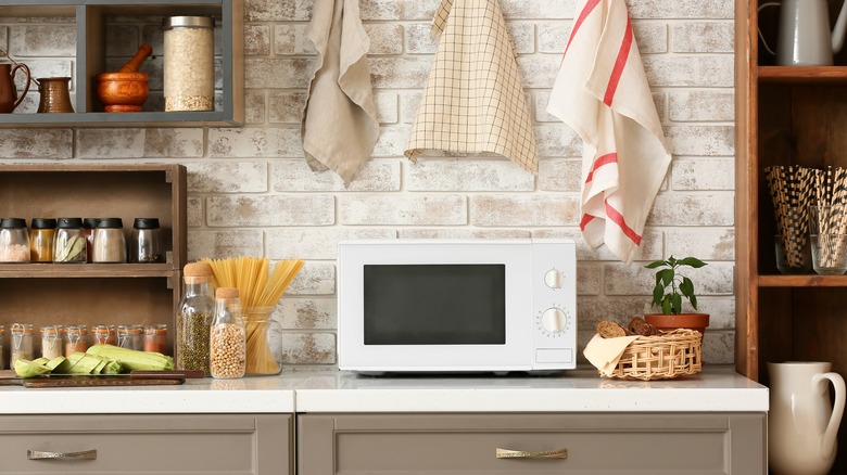 Kitchen counter with white microwave