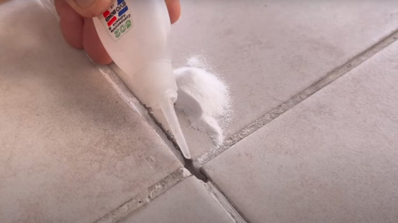 Adding super glue to grout