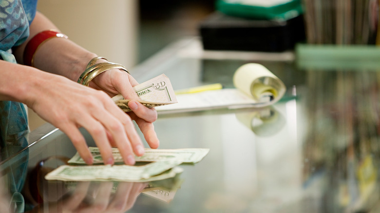 woman counting cash