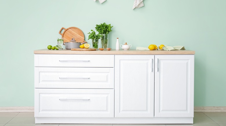 Mint green kitchenette wall