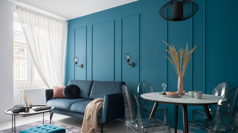 Teal wall in living room