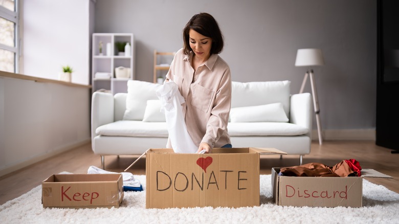 Boxes labeled keep, donate, discard