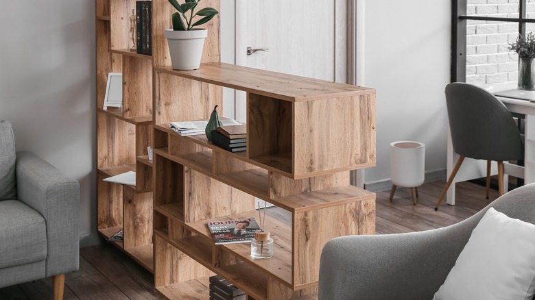 wooden shelves between areas 
