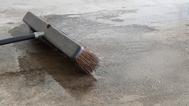 push broom on concrete