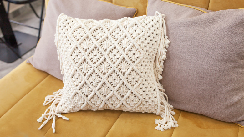 macrame pillow on a sofa