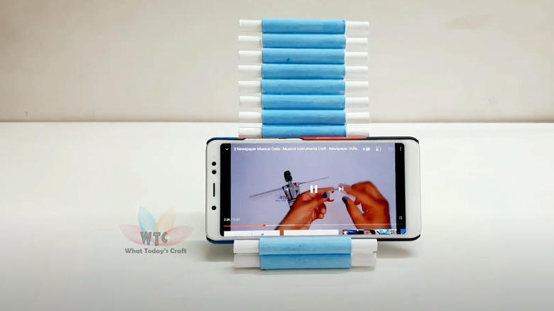 thread spool phone holder