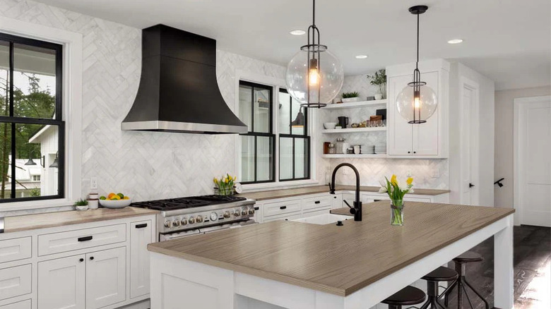 cozy kitchen with wood finished countertop