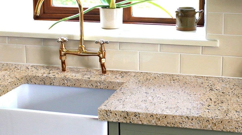 painted faux granite countertop by sink