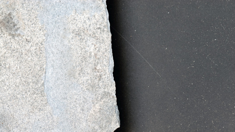 gray countertop with rough rock edge