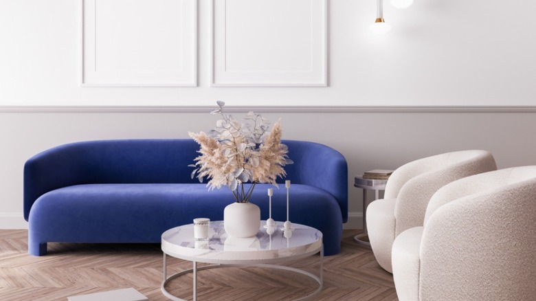 Living room with blue sofa