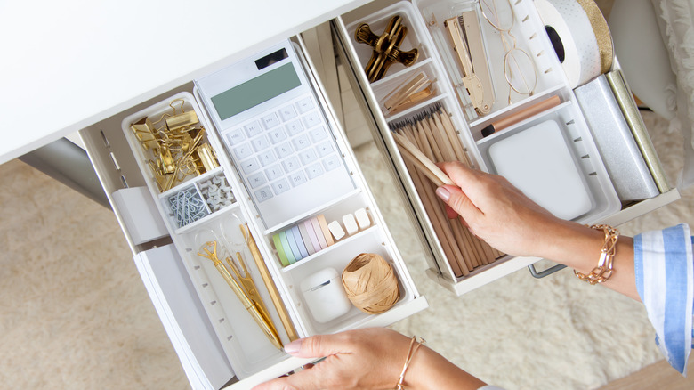 Two drawers with office supplies