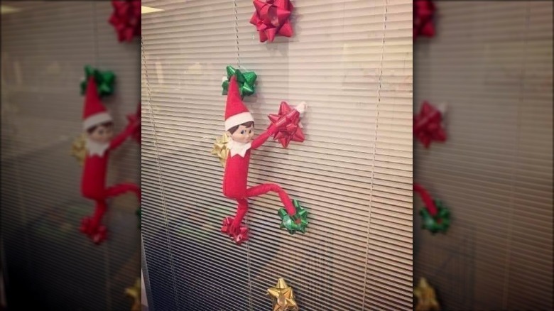 elf on the shelf climbing window