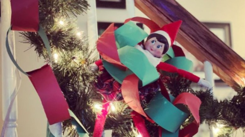 Elf in construction paper garland