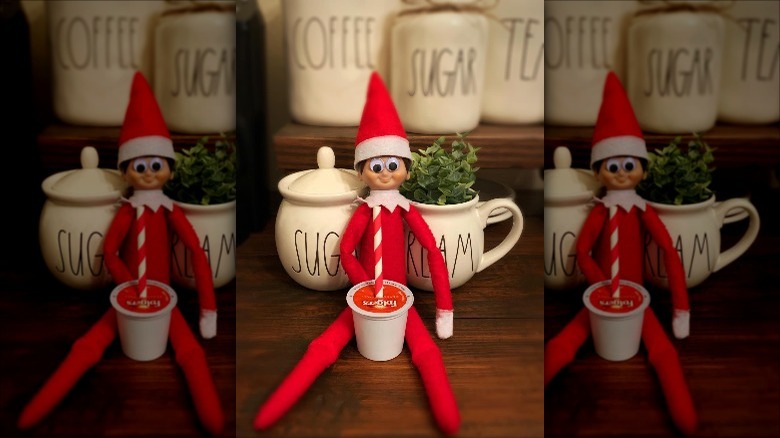 elf with google eyes and coffee