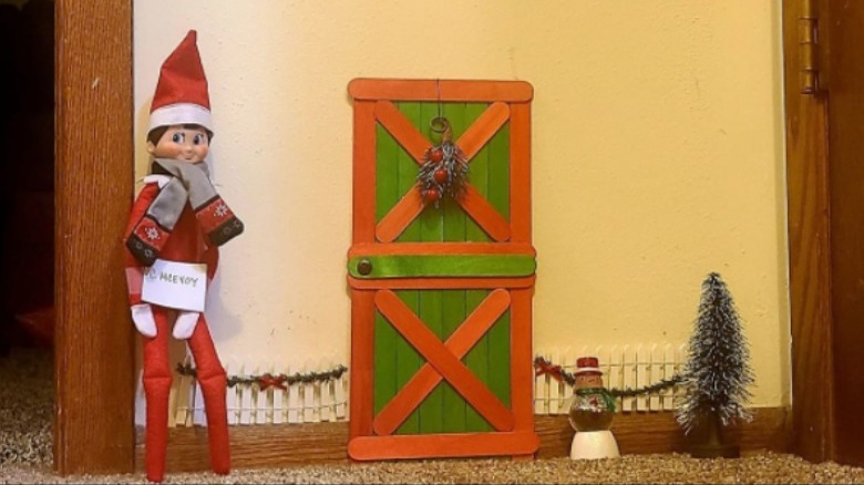 Elf by popsicle stick door