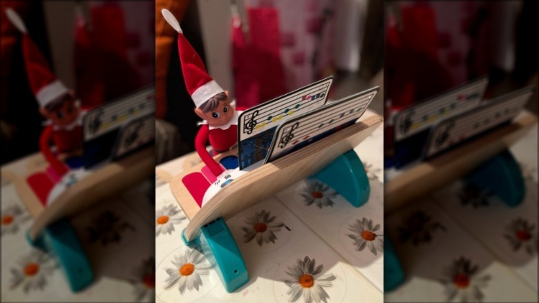 Elf playing toy piano