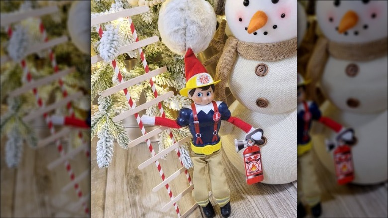Elf dressed as fire fighter