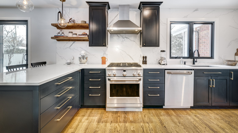 dark kitchen with drawers