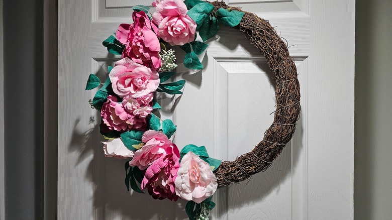 Grapevine wreath with pink flowers