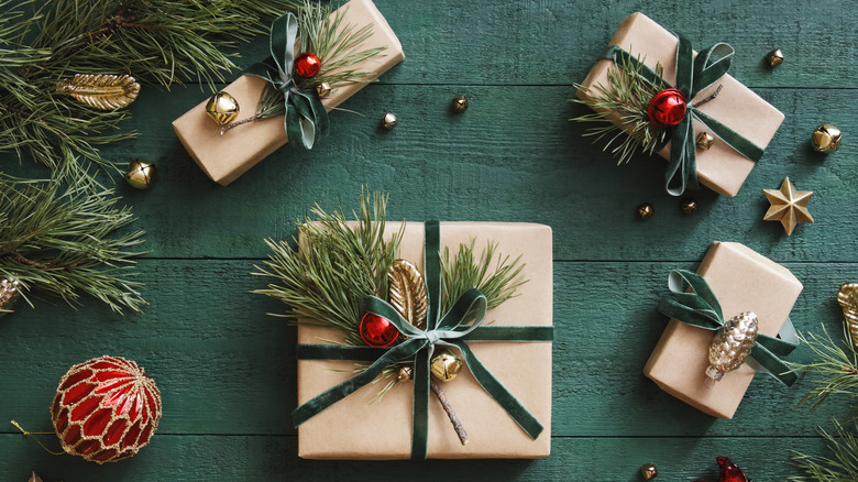 Gifts decorated with greenery sprigs