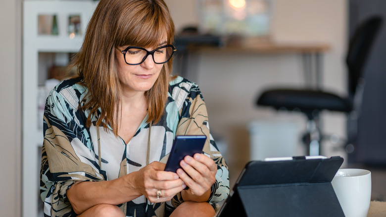 woman ordering something on phone