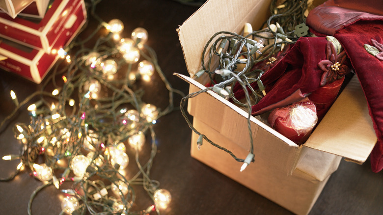 box with tangled Christmas lights