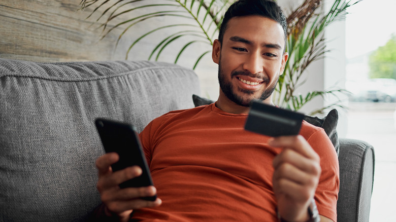 man buying something on phone