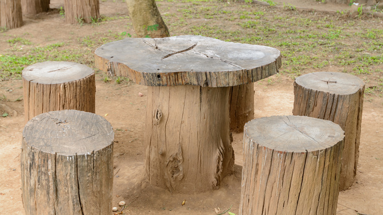 table and stools made from logs