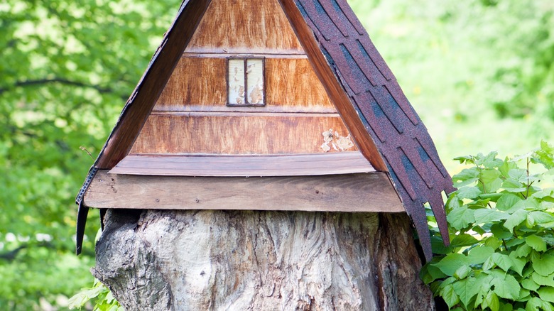 log with DIY roof