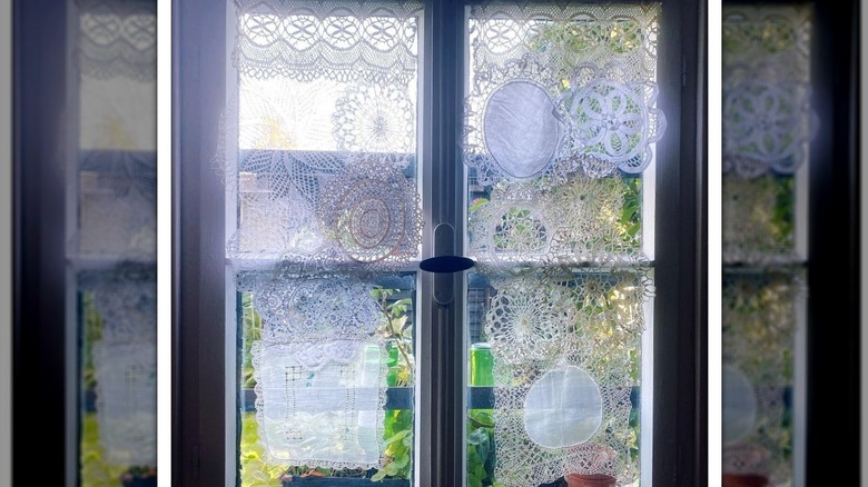 Lace doilies hung over window