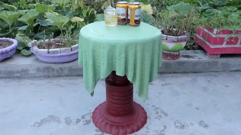 towel and concrete side table 