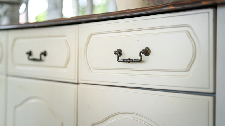 two white drawers in kitchen