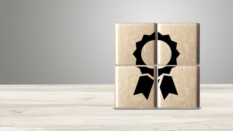 wooden cubes with ribbon icon