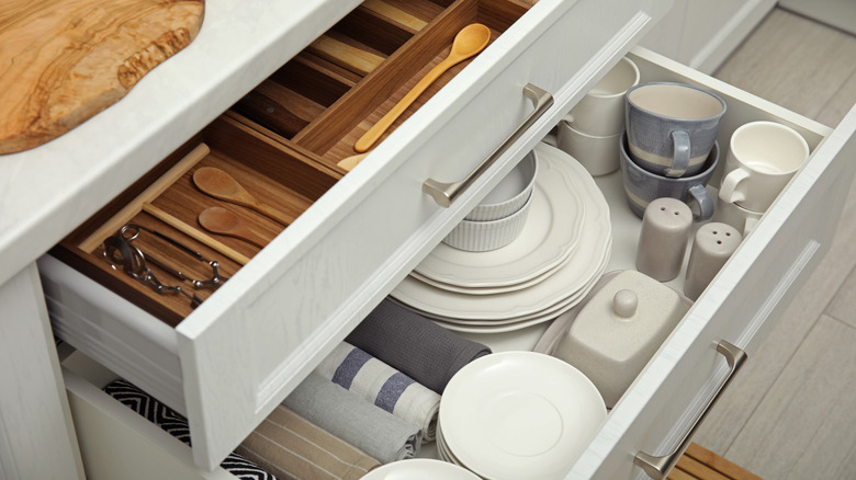 open kitchen cabinet drawers
