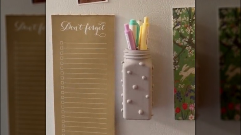 spice jar filled with pens