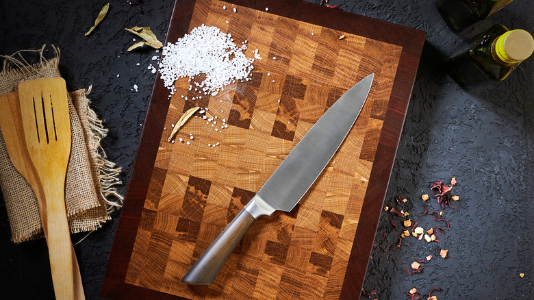 knife on wooden cutting board