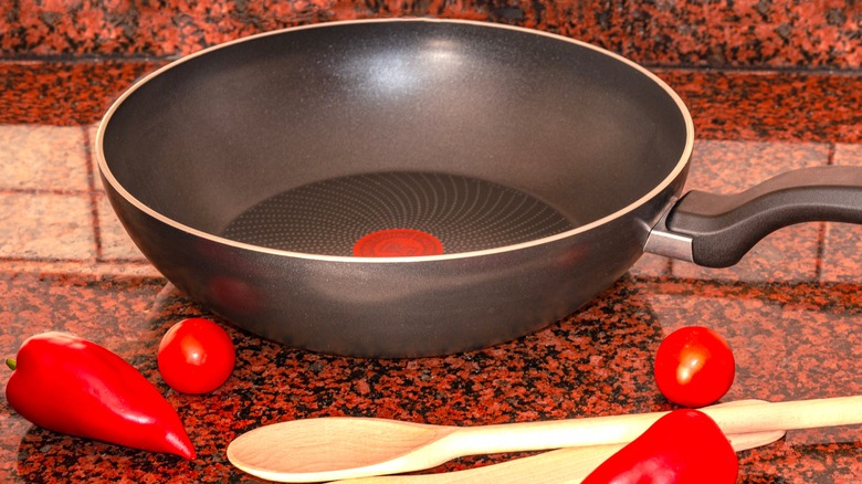 Pan sitting on top of granite countertop