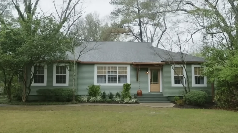 green siding home exterior 