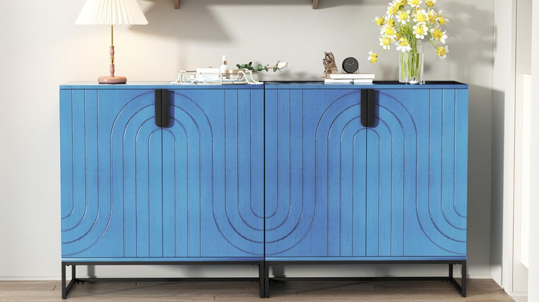 blue cabinet with curved design