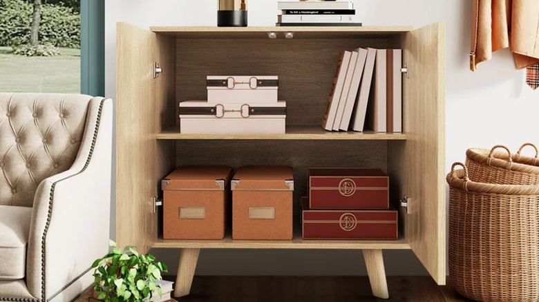 open cabinet filled with paper boxes