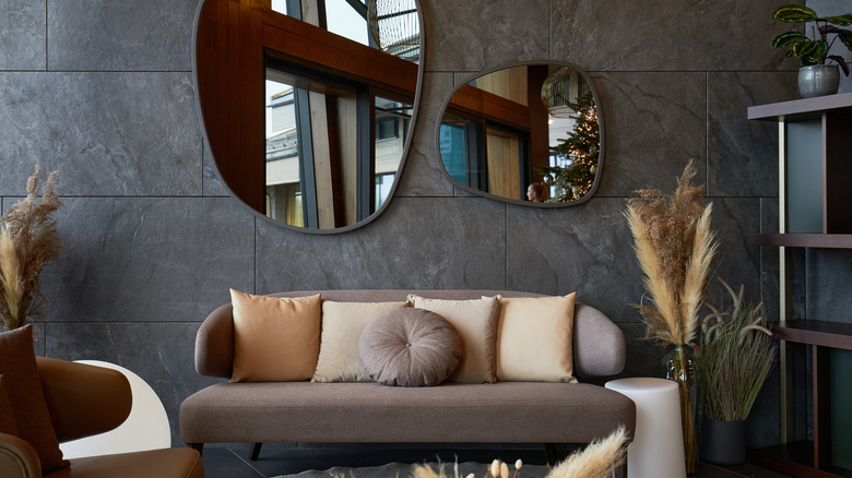 mirrors above sofa