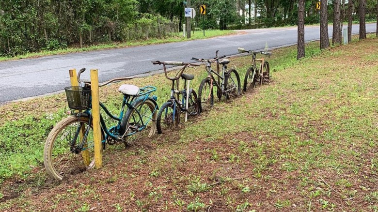 repurposed bike fence in yard