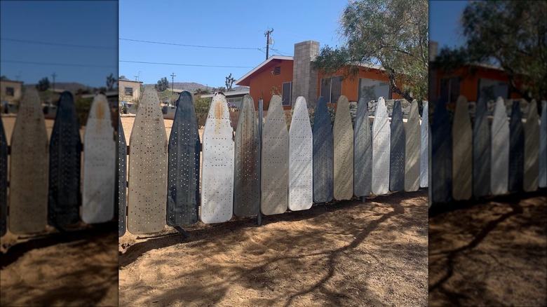 repurposed metal ironing board fence