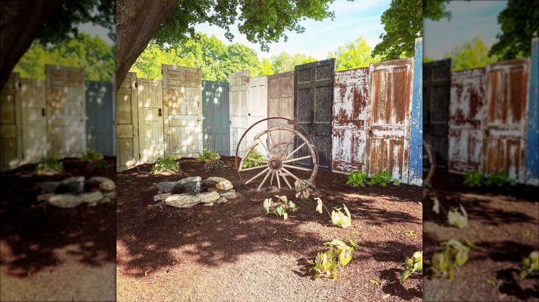 repurposed wood door fence