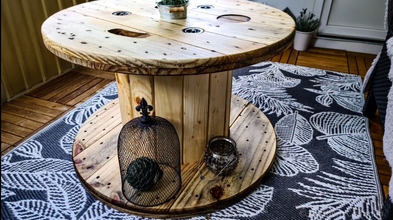 wooden cable spool with decor